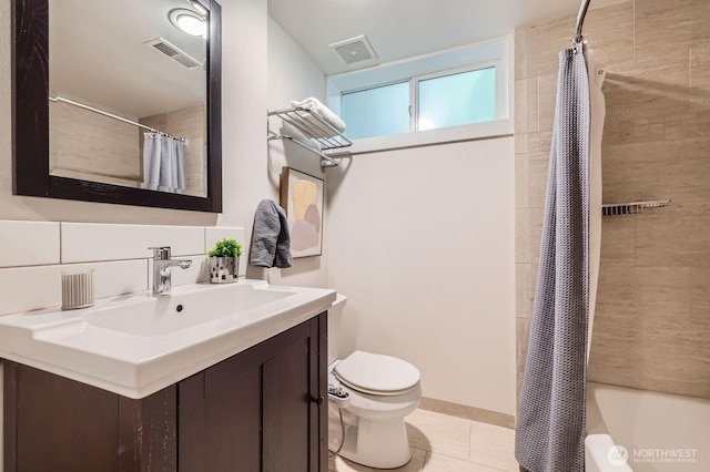 11446 Ohde Ave, Kirkland, WA 98033 - bathroom with vanity, tile patterned floors, and shower / bath combo with shower curtain