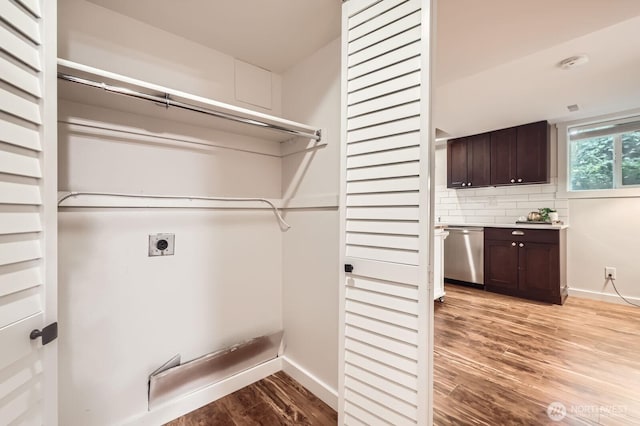 11446 Ohde Ave, Kirkland, WA 98033 - laundry area featuring electric dryer hookup and light wood-style floors