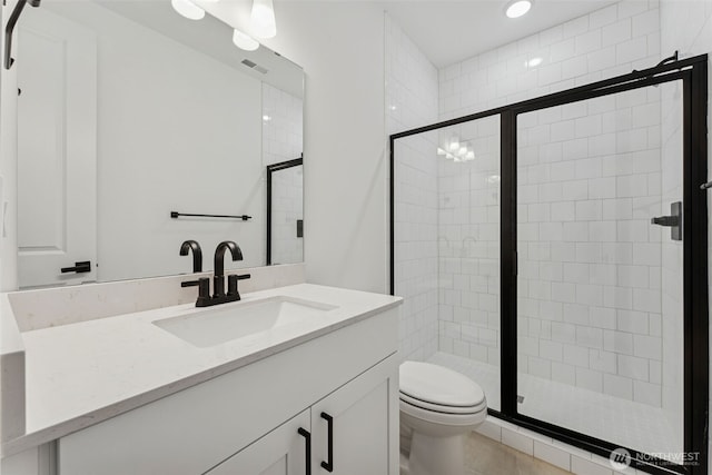 15410 210th Ave E Unit 316, Bonney Lake, WA 98391 - bathroom featuring vanity, a shower stall, and recessed lighting