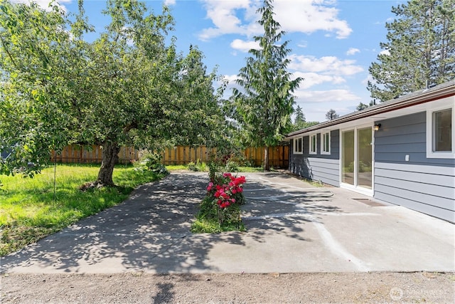 7611 Easy St, Everett, WA 98203 - fenced backyard with a patio area and concrete driveway