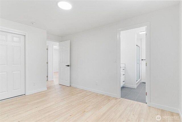 7611 Easy St, Everett, WA 98203 - unfurnished bedroom featuring light wood finished floors and ensuite bathroom