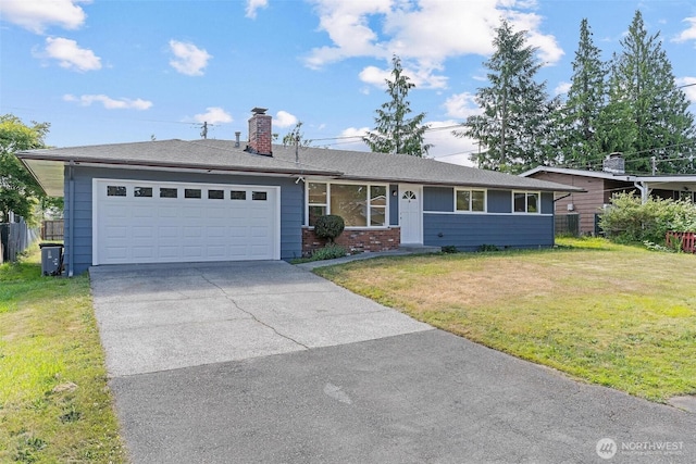 7611 Easy St, Everett, WA 98203 - ranch-style home featuring an attached garage, a chimney, concrete driveway, and a front lawn