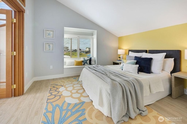950 Beckett Point Rd, Port Townsend, WA 98368 - bedroom with wood finished floors and lofted ceiling