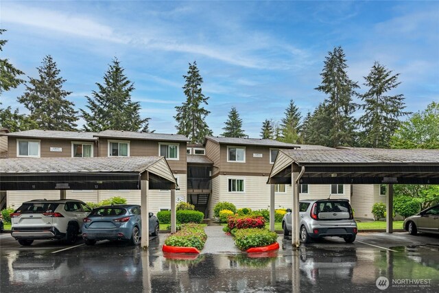 12617 NE 130th Way Unit E303, Kirkland, WA 98034 - view of front facade with covered parking