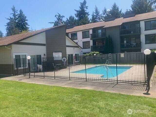 12617 NE 130th Way Unit E303, Kirkland, WA 98034 - community pool featuring a patio