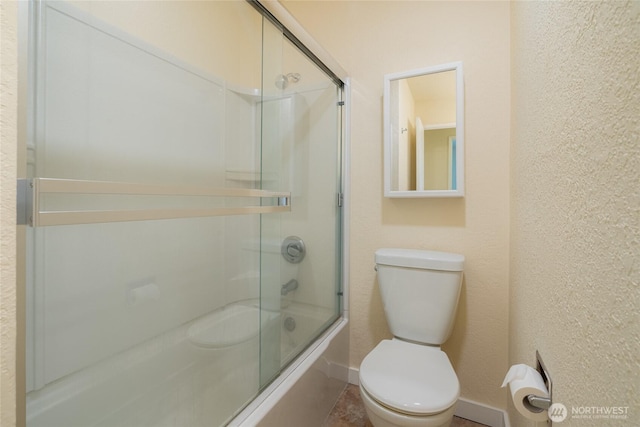 12617 NE 130th Way Unit E303, Kirkland, WA 98034 - full bathroom with shower / bath combination with glass door and a textured wall
