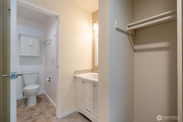 12617 NE 130th Way Unit E303, Kirkland, WA 98034 - bathroom featuring vanity and a textured wall