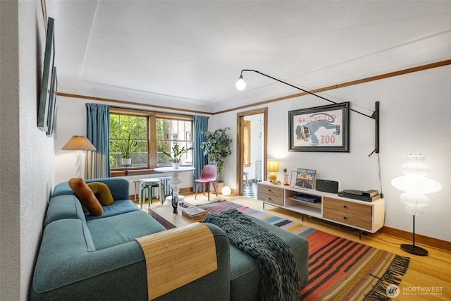 1631 16th Ave Unit 114, Seattle, WA 98122 - living area featuring wood finished floors and crown molding