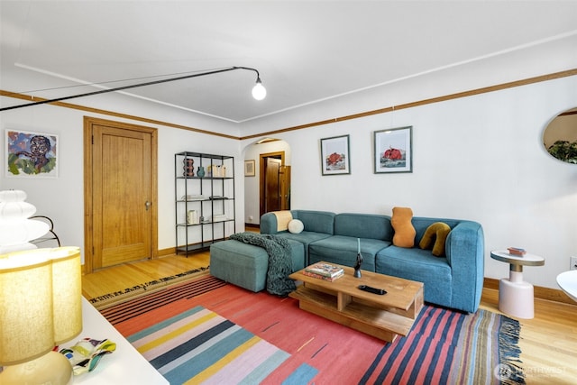 1631 16th Ave Unit 114, Seattle, WA 98122 - living room with arched walkways and wood finished floors