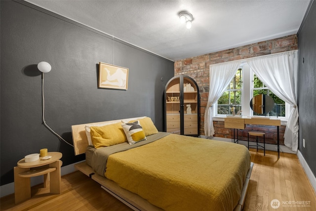 1631 16th Ave Unit 114, Seattle, WA 98122 - bedroom featuring wood finished floors