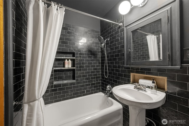 1631 16th Ave Unit 114, Seattle, WA 98122 - bathroom featuring shower / bath combination with curtain