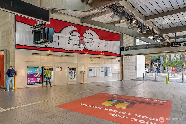 1631 16th Ave Unit 114, Seattle, WA 98122 - building lobby featuring a towering ceiling and beamed ceiling