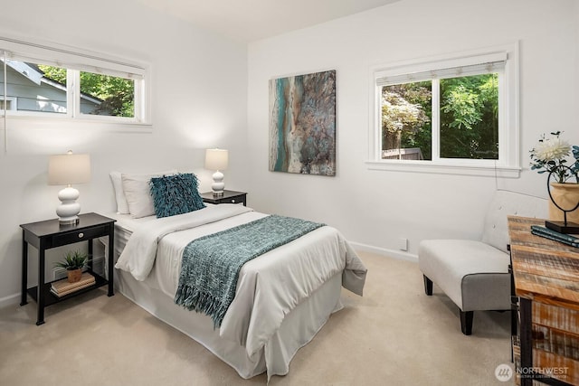4754 46th Ave NE, Seattle, WA 98105 - bedroom featuring light carpet and multiple windows