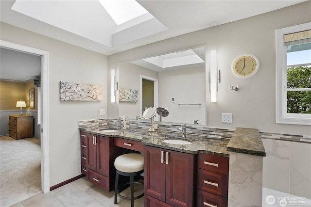 2601 59th St SW, Everett, WA 98203 - full bathroom featuring double vanity, a skylight, and tile patterned flooring