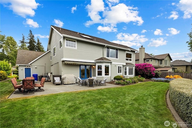 2601 59th St SW, Everett, WA 98203 - back of property featuring a patio and roof with shingles