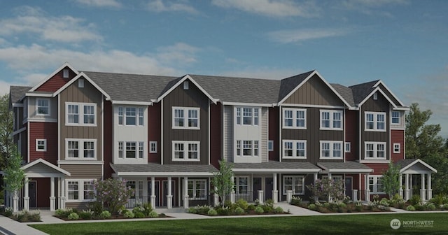 19264 NE 69th Cir Unit 102, Redmond, WA 98052 - townhome / multi-family property with board and batten siding and a front yard