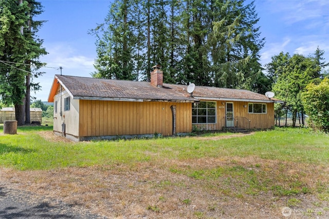 1608 State Route 6, Raymond, WA 98577 - view of front of home with a chimney and a front yard