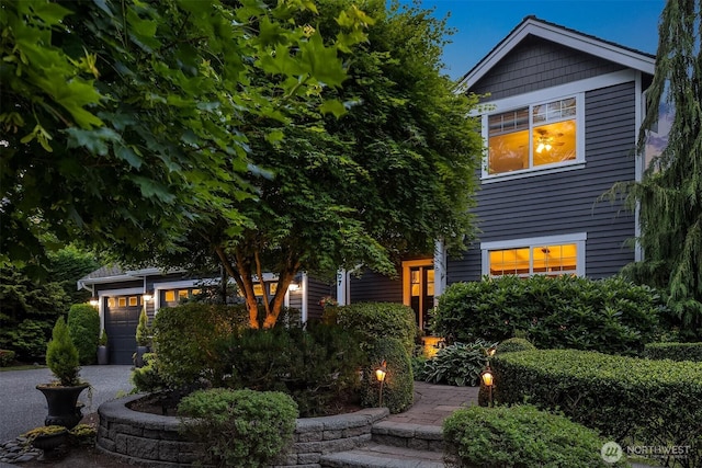 8907 NE 152nd Pl, Bothell, WA 98011 - view of front of house featuring driveway and a garage