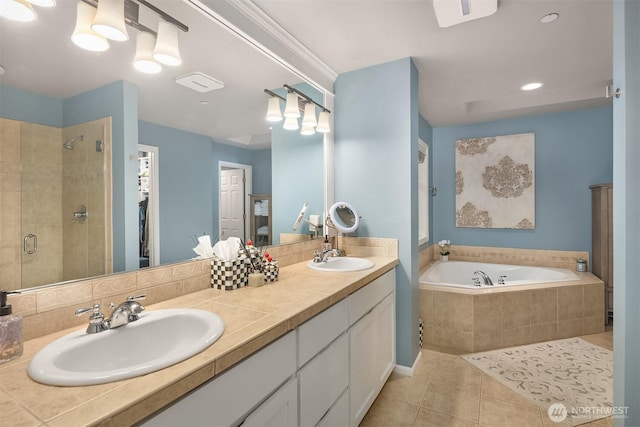 8907 NE 152nd Pl, Bothell, WA 98011 - full bath featuring tile patterned floors, a shower stall, a bath, double vanity, and recessed lighting