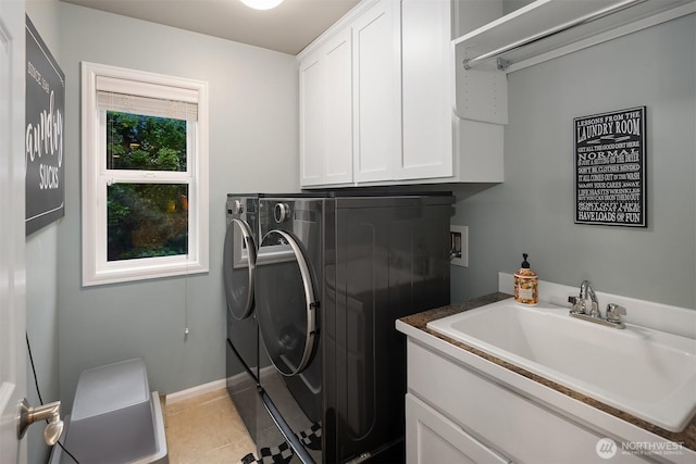8907 NE 152nd Pl, Bothell, WA 98011 - laundry room with washer and dryer, cabinet space, and light tile patterned floors