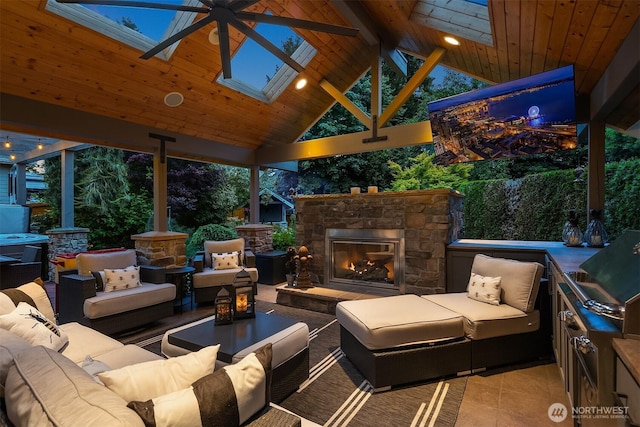 8907 NE 152nd Pl, Bothell, WA 98011 - view of patio with an outdoor living space with a fireplace, ceiling fan, and area for grilling