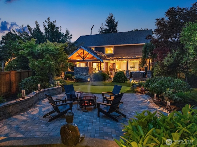 8907 NE 152nd Pl, Bothell, WA 98011 - rear view of property with an outdoor fire pit, a patio area, and a pergola