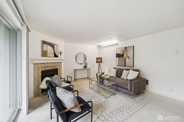 10004 100th Ave NE Unit K202, Kirkland, WA 98034 - living area featuring light carpet, crown molding, and a tile fireplace