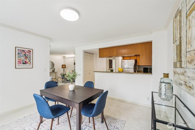 10004 100th Ave NE Unit K202, Kirkland, WA 98034 - dining area with ornamental molding