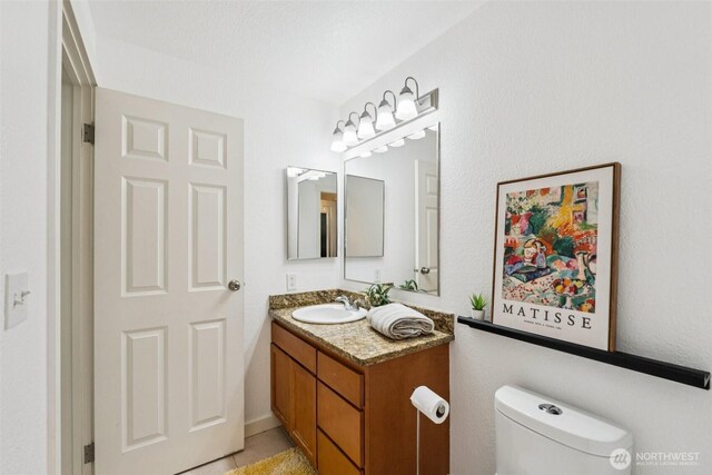 10004 100th Ave NE Unit K202, Kirkland, WA 98034 - bathroom featuring vanity and toilet