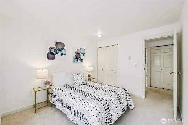 10004 100th Ave NE Unit K202, Kirkland, WA 98034 - carpeted bedroom featuring baseboards and a closet