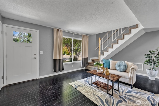 16318 128th Pl SE, Renton, WA 98058 - living room with a textured ceiling, stairway, and wood finished floors