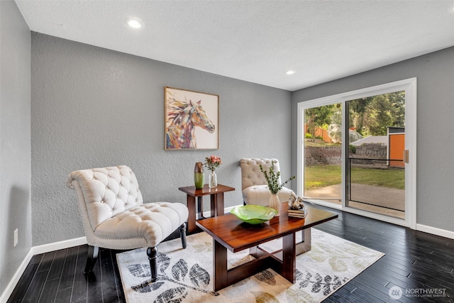 16318 128th Pl SE, Renton, WA 98058 - living area featuring a textured wall, wood finished floors, and recessed lighting