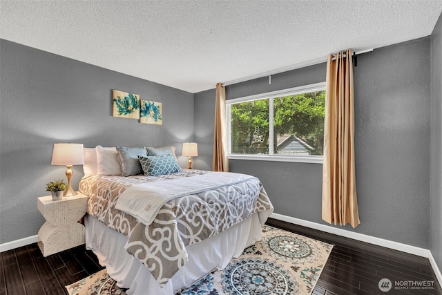16318 128th Pl SE, Renton, WA 98058 - bedroom featuring wood finished floors, a textured wall, and a textured ceiling