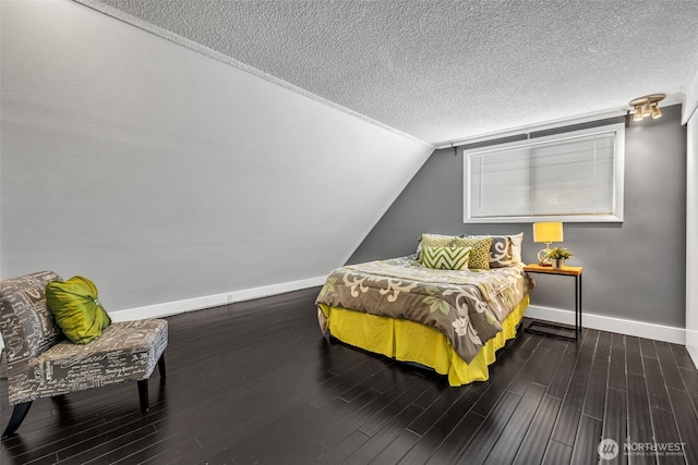 16318 128th Pl SE, Renton, WA 98058 - bedroom with wood finished floors, a textured ceiling, and vaulted ceiling