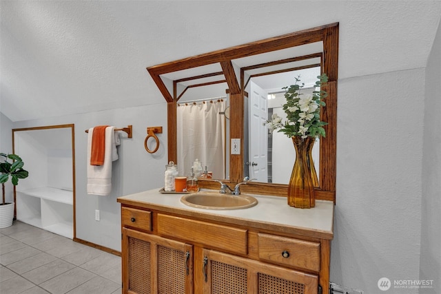 16318 128th Pl SE, Renton, WA 98058 - bathroom with vanity, tile patterned flooring, and a textured ceiling