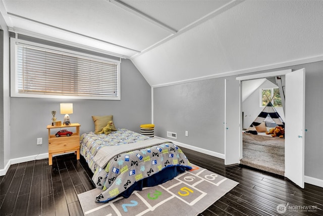 16318 128th Pl SE, Renton, WA 98058 - bedroom featuring wood finished floors and vaulted ceiling