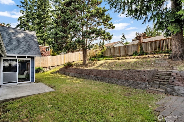16318 128th Pl SE, Renton, WA 98058 - fenced backyard featuring a patio area