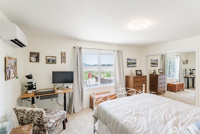 4452 Saltspring Dr, Ferndale, WA 98248 - bedroom with carpet, a wall unit AC, and a textured ceiling