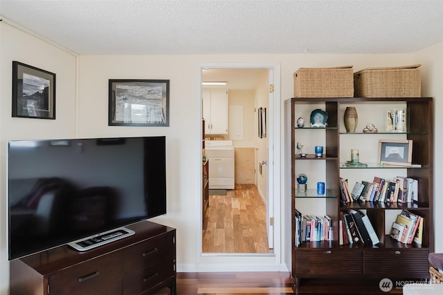 4452 Saltspring Dr, Ferndale, WA 98248 - interior space with washer / dryer and wood finished floors
