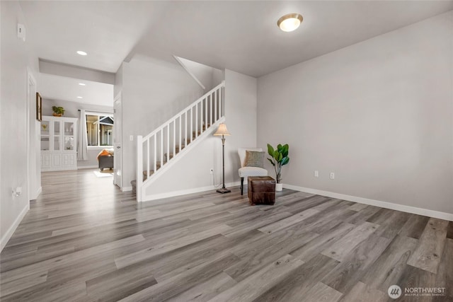 803 Loves Hill Dr, Sultan, WA 98294 - unfurnished room featuring stairs, wood finished floors, and recessed lighting
