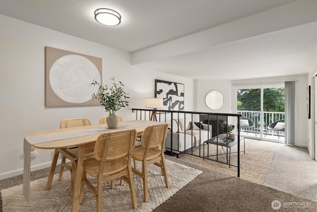 9484 Redmond-Woodinville Rd NE Unit C-205, Redmond, WA 98052 - carpeted dining space featuring baseboards