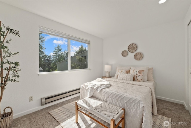 9484 Redmond-Woodinville Rd NE Unit C-205, Redmond, WA 98052 - bedroom featuring a baseboard radiator and carpet