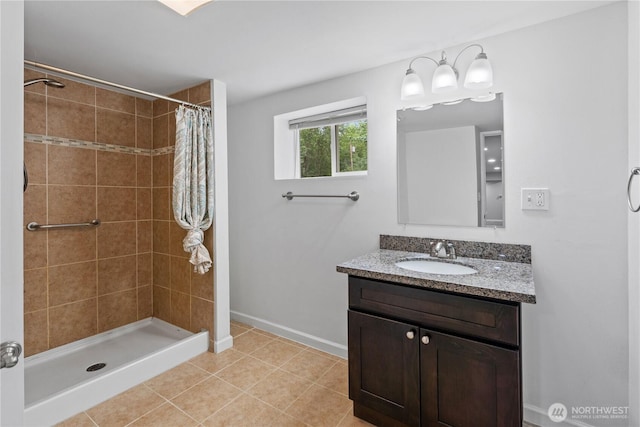 29319 132nd Ave E, Graham, WA 98338 - full bath with vanity, tiled shower, and tile patterned flooring