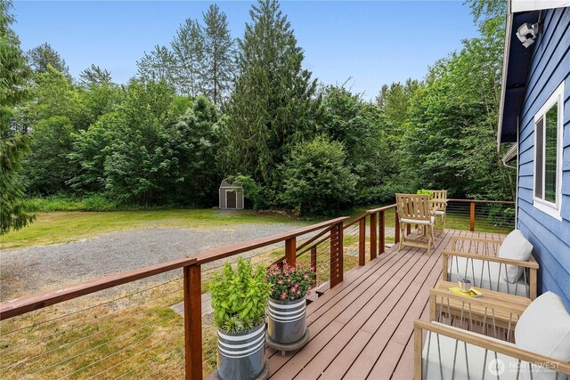29319 132nd Ave E, Graham, WA 98338 - deck with a storage unit and a lawn
