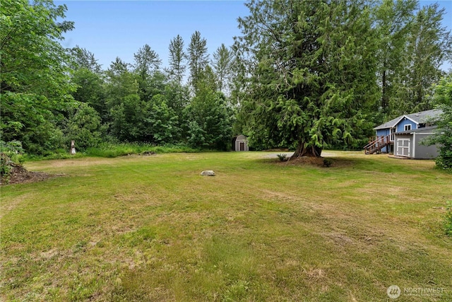 29319 132nd Ave E, Graham, WA 98338 - view of grassy yard with a shed and stairway