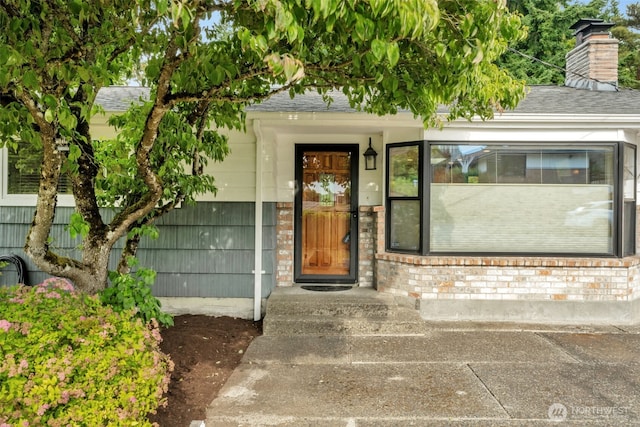 13102 16th Ave SW, Burien, WA 98146 - doorway to property featuring brick siding and a chimney
