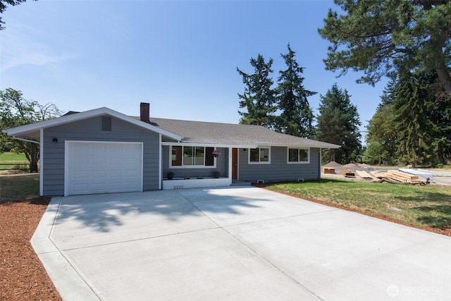 150 Sunland Dr, Sequim, WA 98382 - ranch-style home with a garage, concrete driveway, a chimney, and a front lawn