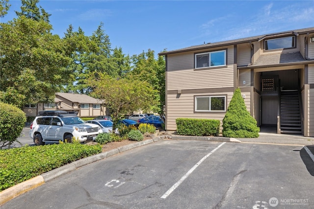 4709 176th St SW Unit C1, Lynnwood, WA 98037 - view of property featuring uncovered parking