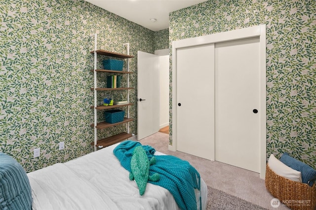 3626 1st Ave NW Unit A, Seattle, WA 98107 - carpeted bedroom featuring wallpapered walls and a closet