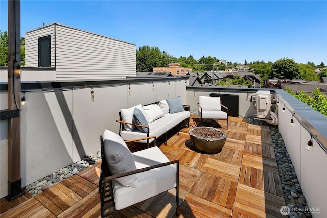 3626 1st Ave NW Unit A, Seattle, WA 98107 - wooden terrace featuring an outdoor living space
